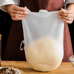 Magic Silicone Kneading Dough Bag in white, perfect for kneading dough, marinating meats, and easy cleanup in the kitchen.