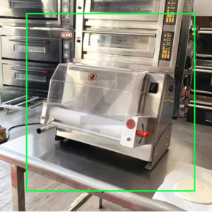 Manual commercial pizza dough press machine in stainless steel with adjustable thickness settings.