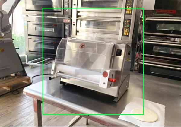 Manual commercial pizza dough press machine in stainless steel with adjustable thickness settings.